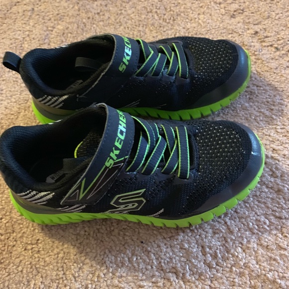 green and black skechers